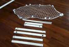 O gol caixote desmontado contém seis postes e uma rede gol caixote Actual